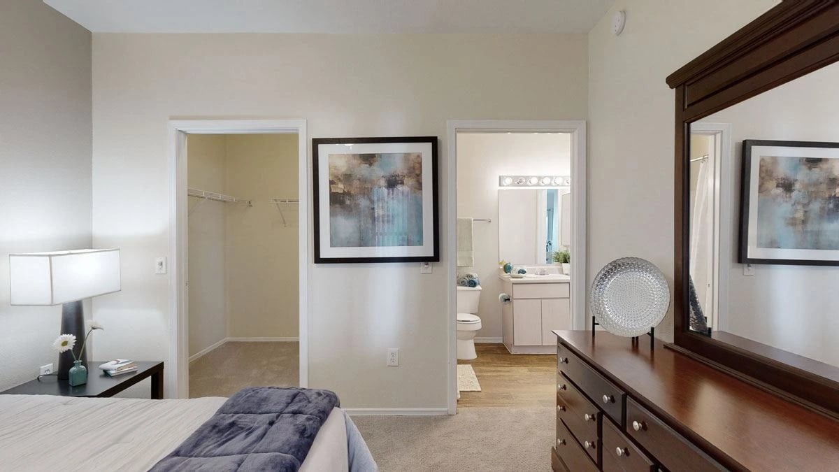 Bedroom with closet and en-suite bathroom.
