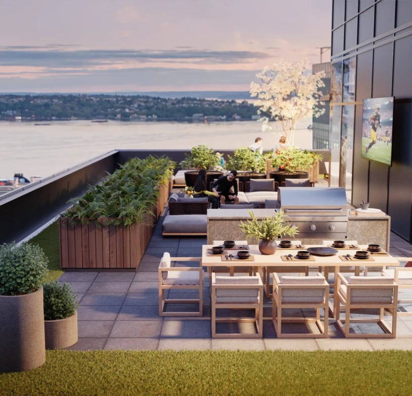 Rooftop patio with dining table, grill, lounge seating, and city views.