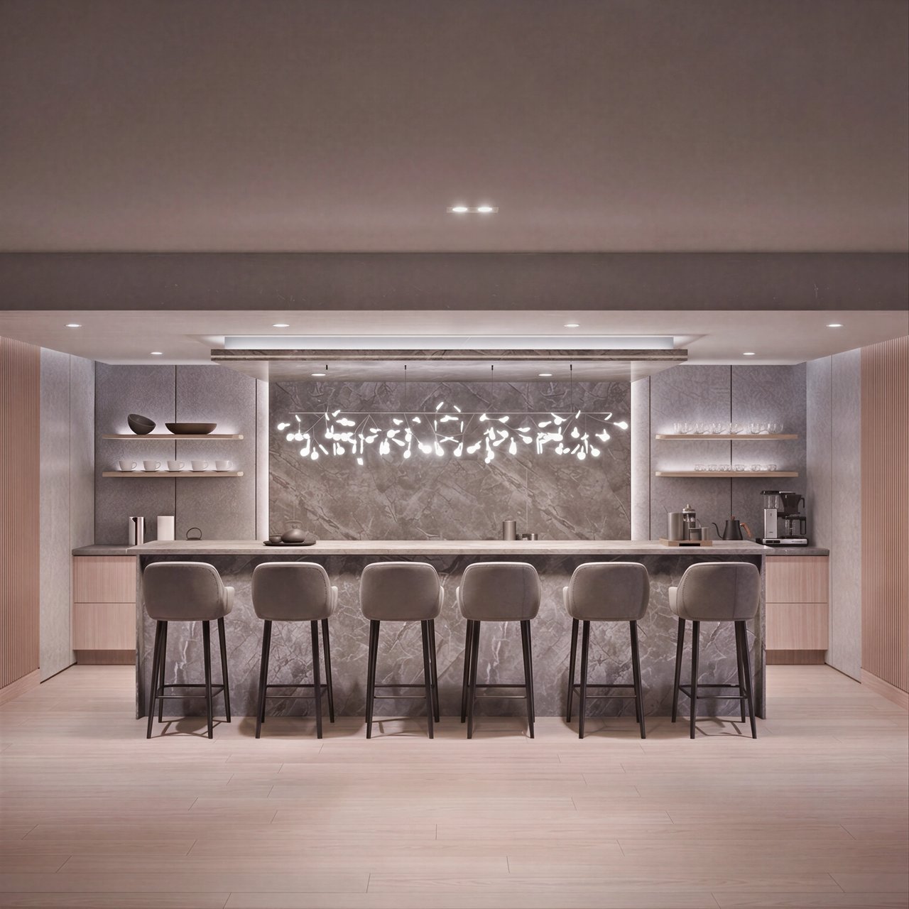 Modern kitchen island with bar stools and a contemporary chandelier.