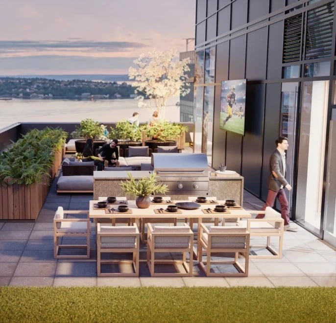 Rooftop patio with dining table, grill, seating, and city views.