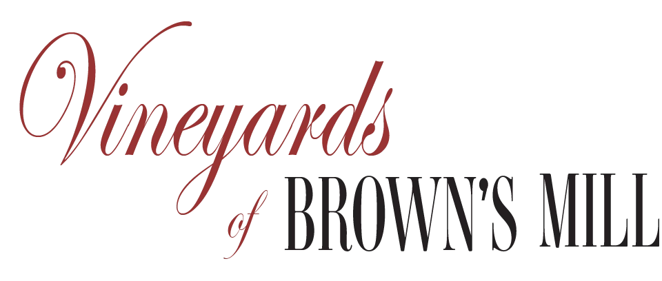 Vineyards of Brown's Mill Apartments logo.
