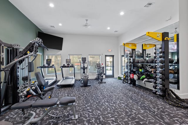 Interior view of a modern fitness center with exercise equipment
