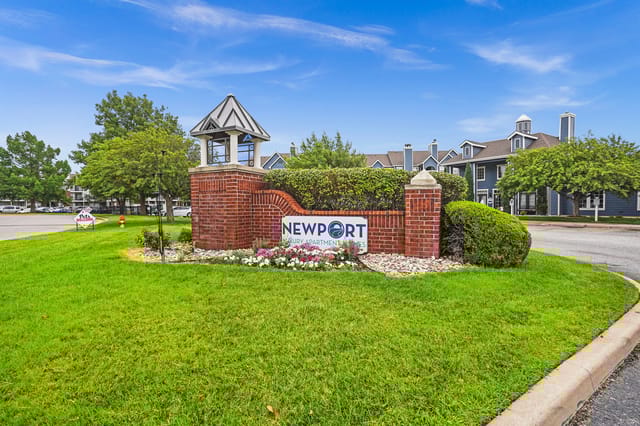 on the levee apartments for rent sign in front of yard