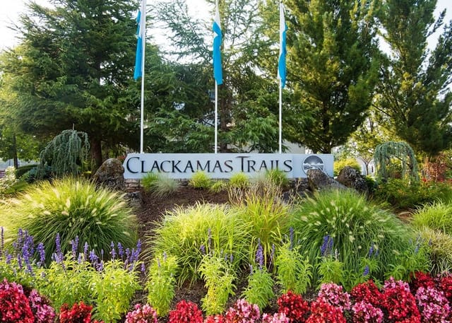 Clackamas Trails monument sign with landscaping
