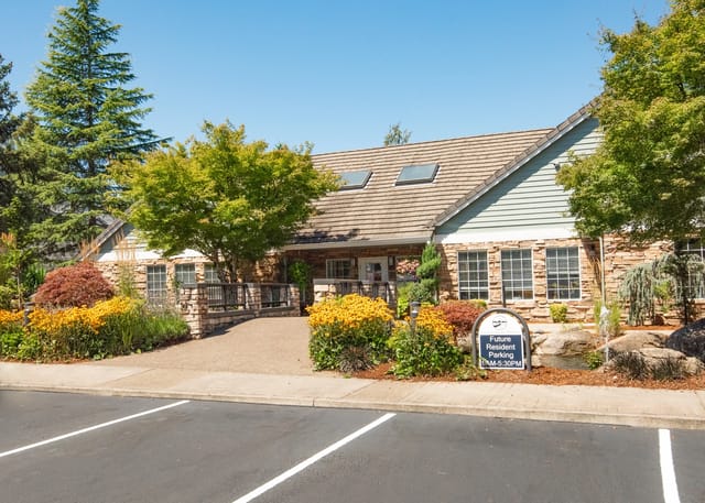 The property's entrance with a sign for future resident parking.