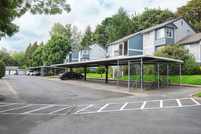 Covered parking and bike racks at a multifamily property.