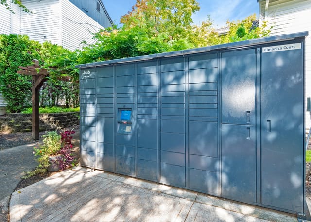 Secure package lockers for residents at Elmonica Court.