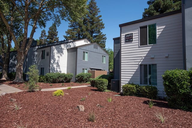 Exterior buildings with trees and landscaping