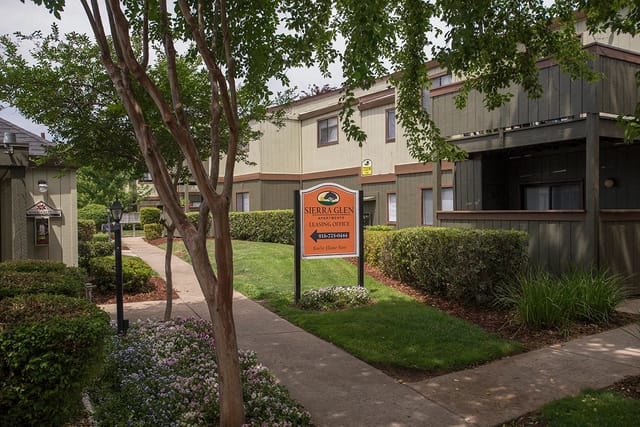 Sierra Glen Apartments community exterior with signage and landscaping.