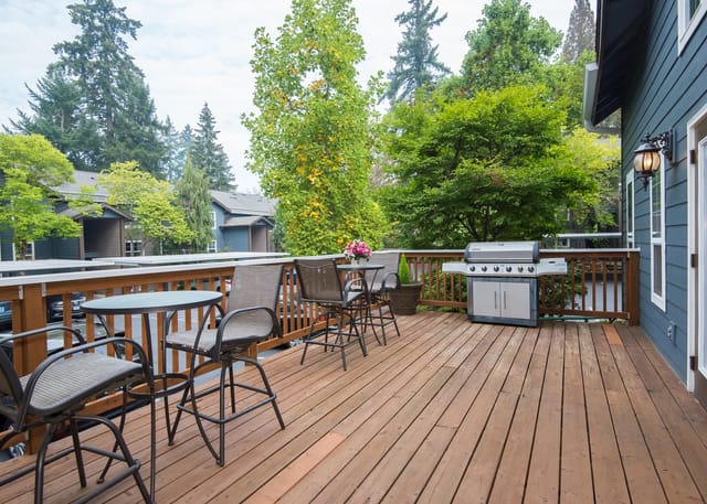 Private balcony with seating and grill