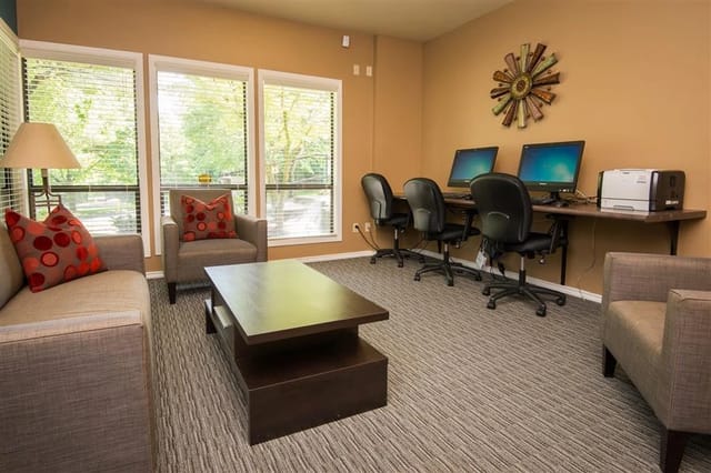 Business center with computers and printers