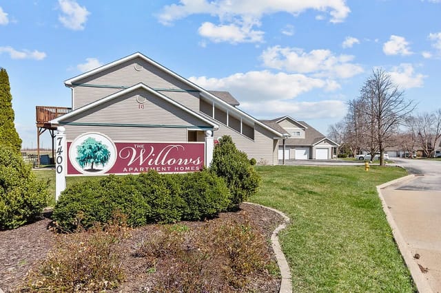 The Willows Apartment Homes monument sign with address 7400