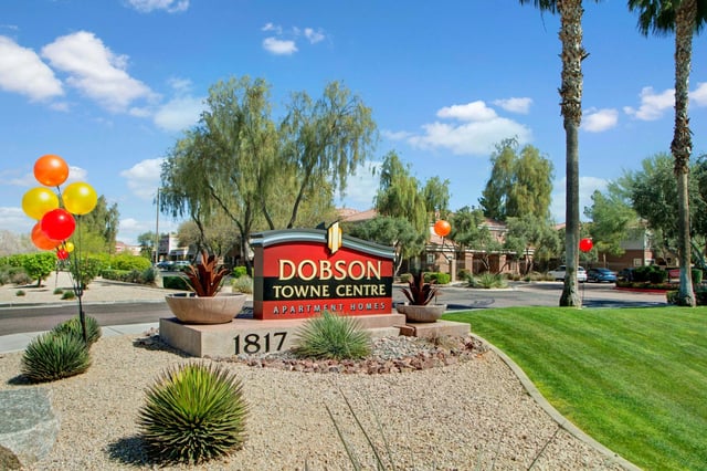 Dobson Towne Centre apartment homes monument sign with balloons