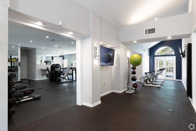 State-of-the-art fitness center with cardio machines, free weights, and strength training equipment.