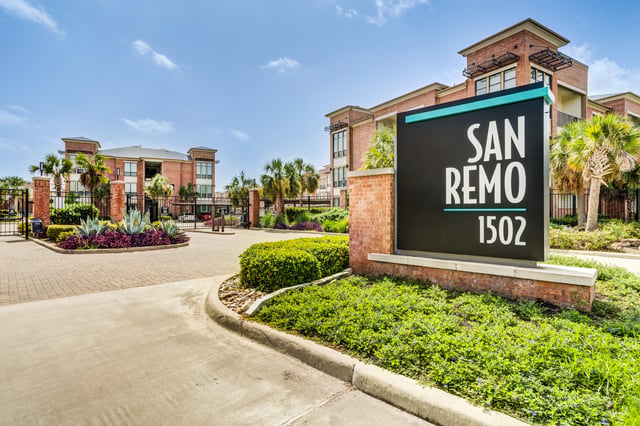 San Remo apartment complex entrance with monument sign.