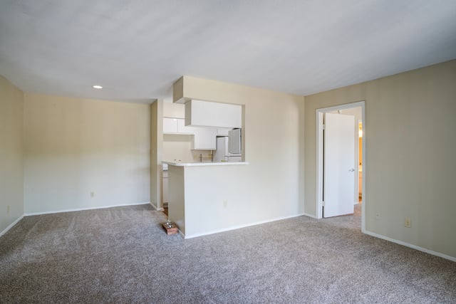 Living room and kitchen area with breakfast bar