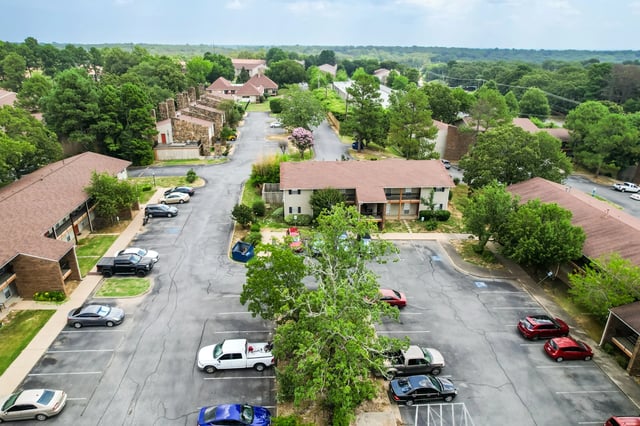 Aerial view of apartment buildings and parking lot