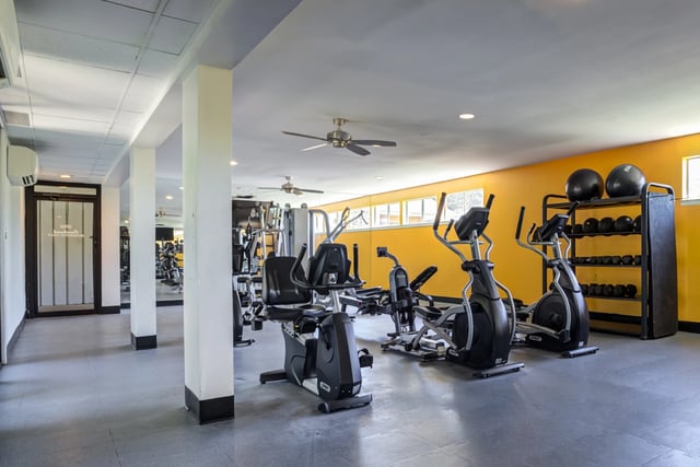 Fitness center with cardio machines and weight equipment