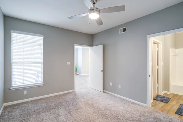 Bedroom with ceiling fan and window