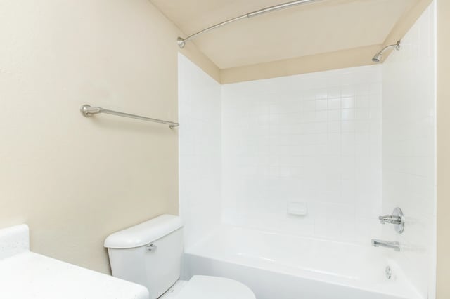 Bathroom with toilet and shower/tub combination