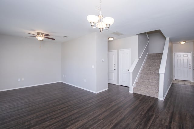 Living room and stairs in an apartment.