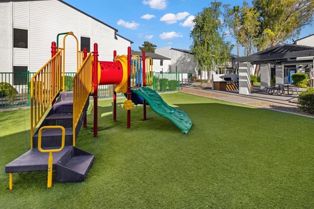 Playground with slide and climbing structure