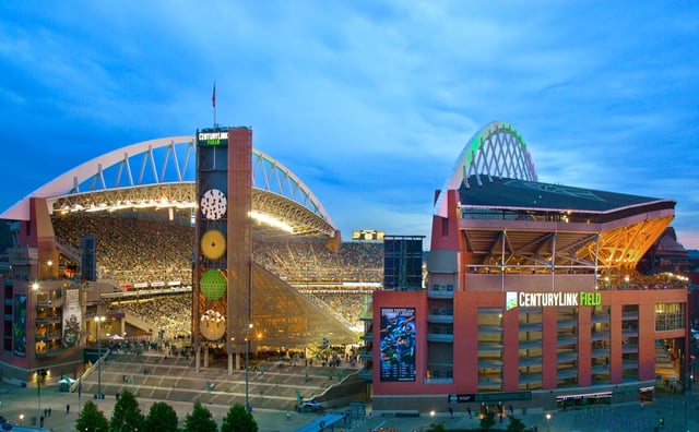 Exterior view of CenturyLink Field stadium at dusk.
