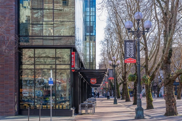 Pioneer Square street view with historic buildings and trees