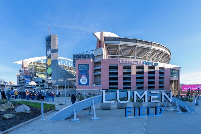 Lumen Field stadium exterior with large signage in front.