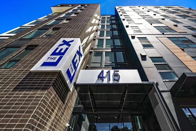 The Lex apartment building exterior with signage and building number 415.