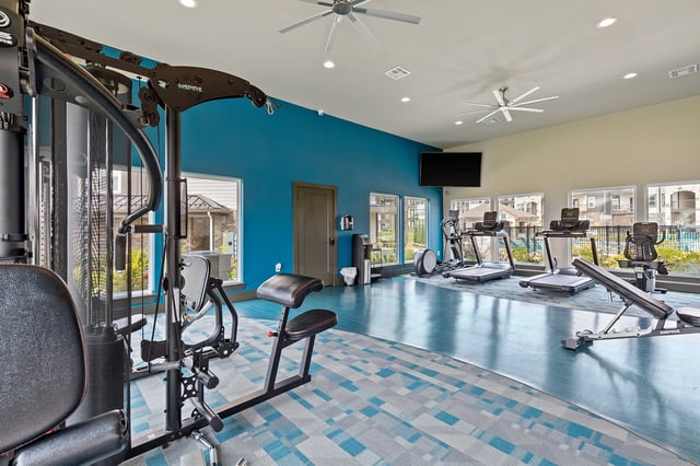 State-of-the-art fitness center with cardio equipment and weight machines.