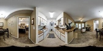 360 virtual tour of an apartment featuring a kitchen, dining area, and living room.