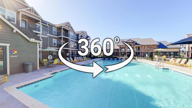 360 virtual tour of community pool with lounge chairs and surrounding apartment buildings.