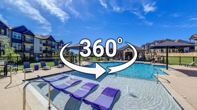 360 virtual tour of an outdoor swimming pool with lounge chairs and apartment buildings in the background.