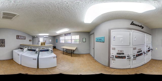 Laundry room with washers and dryers