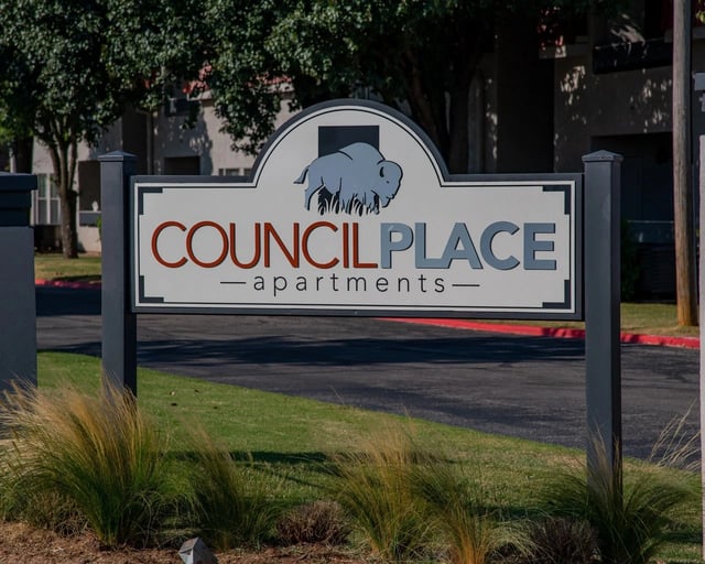 Council Place apartments monument sign with a buffalo logo.