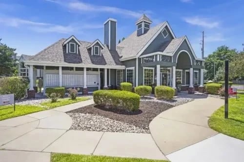 Exterior view of the property office with landscaped yard