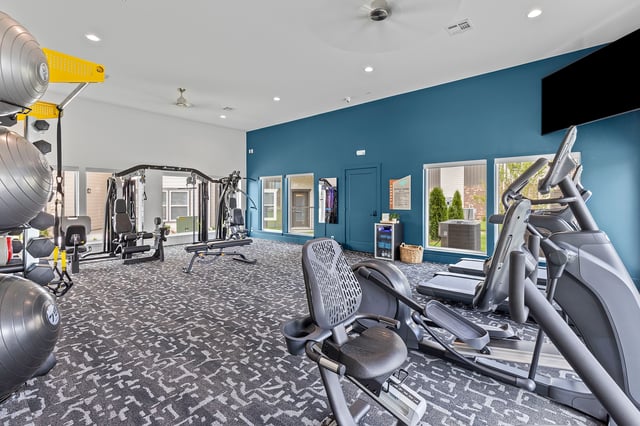 Fitness center with cardio equipment and weight machines