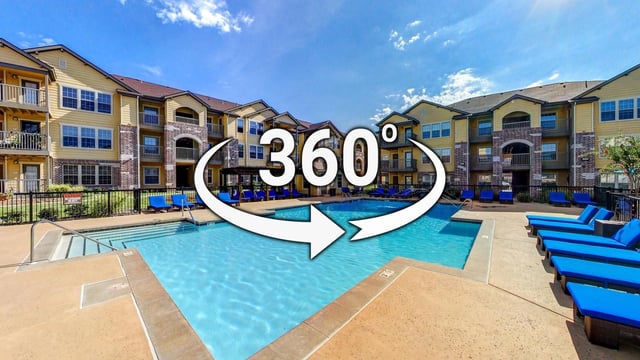 360 virtual tour of the swimming pool and apartment building exterior.