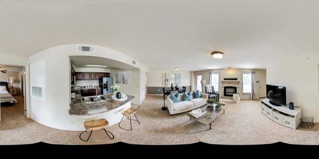 Interior view of a 1-bedroom, 1-bathroom apartment with open-concept living area, kitchen, and bedroom.