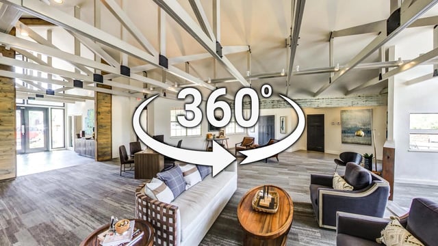 360 virtual tour of the property's modern lobby with seating areas and reception desk.