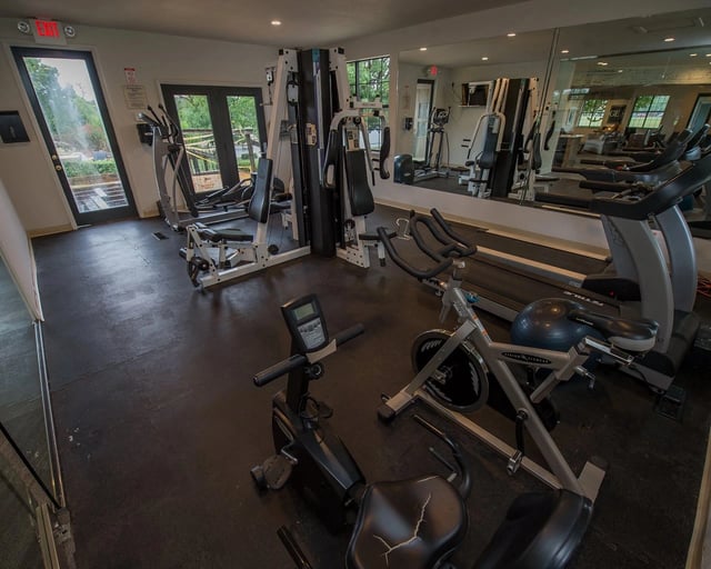 On-site gym with treadmills, stationary bikes, and weight machines.