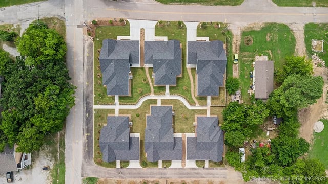 Aerial view of housing development layout with multiple units arranged in a pattern.