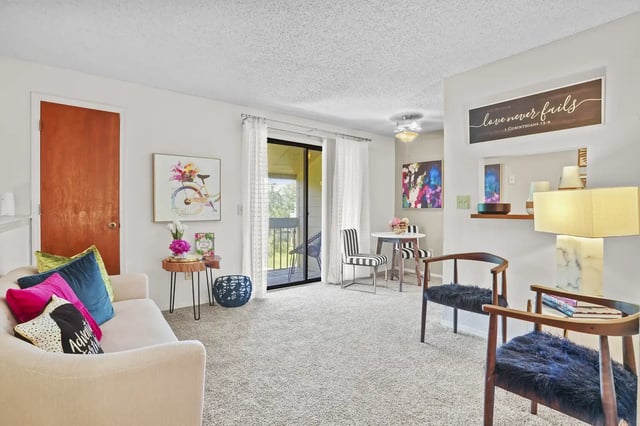 Cozy living room with a couch and dining table