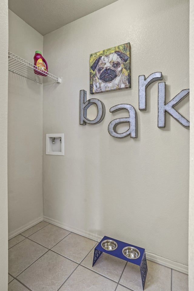 A room with a sign that says "bank" and a picture of a pug.