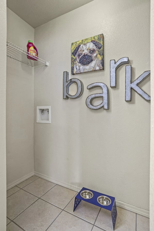 A room with a sign that says "bank" and a picture of a pug.