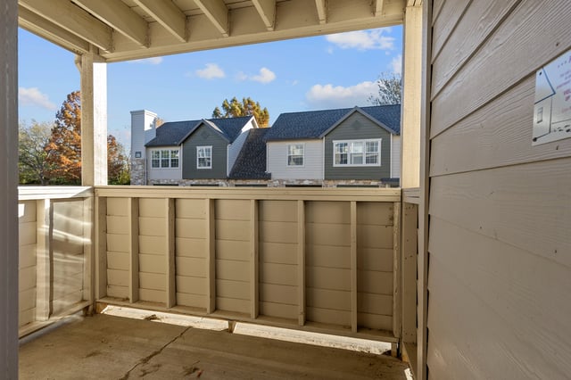 View of apartment buildings from a balcony or patio.