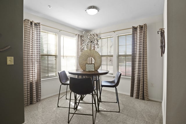 Dining area with table and chairs