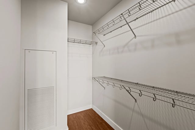 Empty walk-in closet with wire shelving