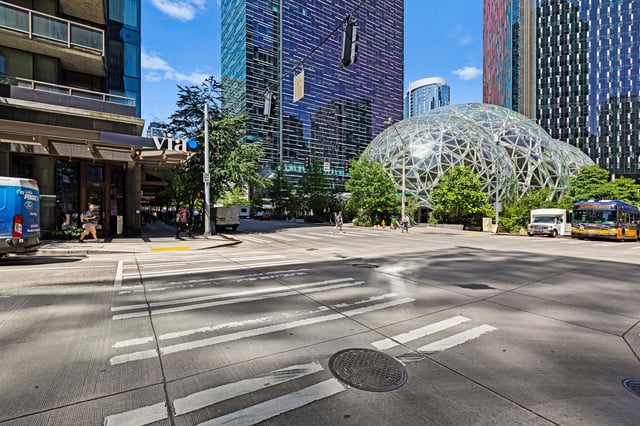 Street view of Via apartments building entrance with Amazon Spheres in background